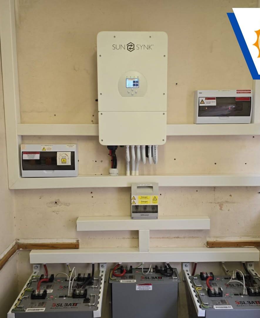 Inverter and battery bank on a cream wall