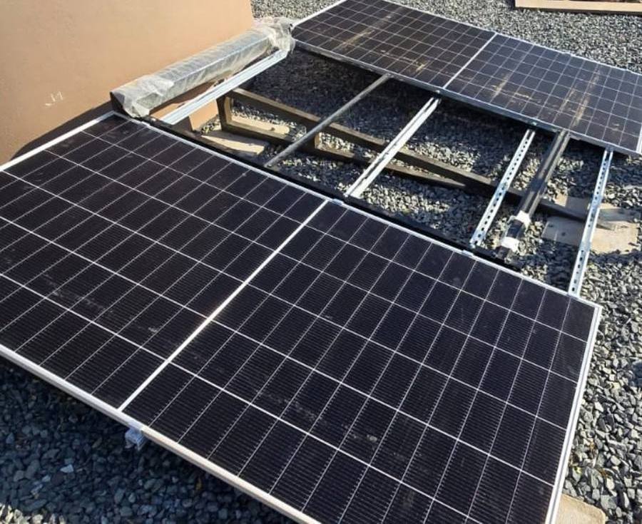 Solar panel on a mounting frame over gravel
